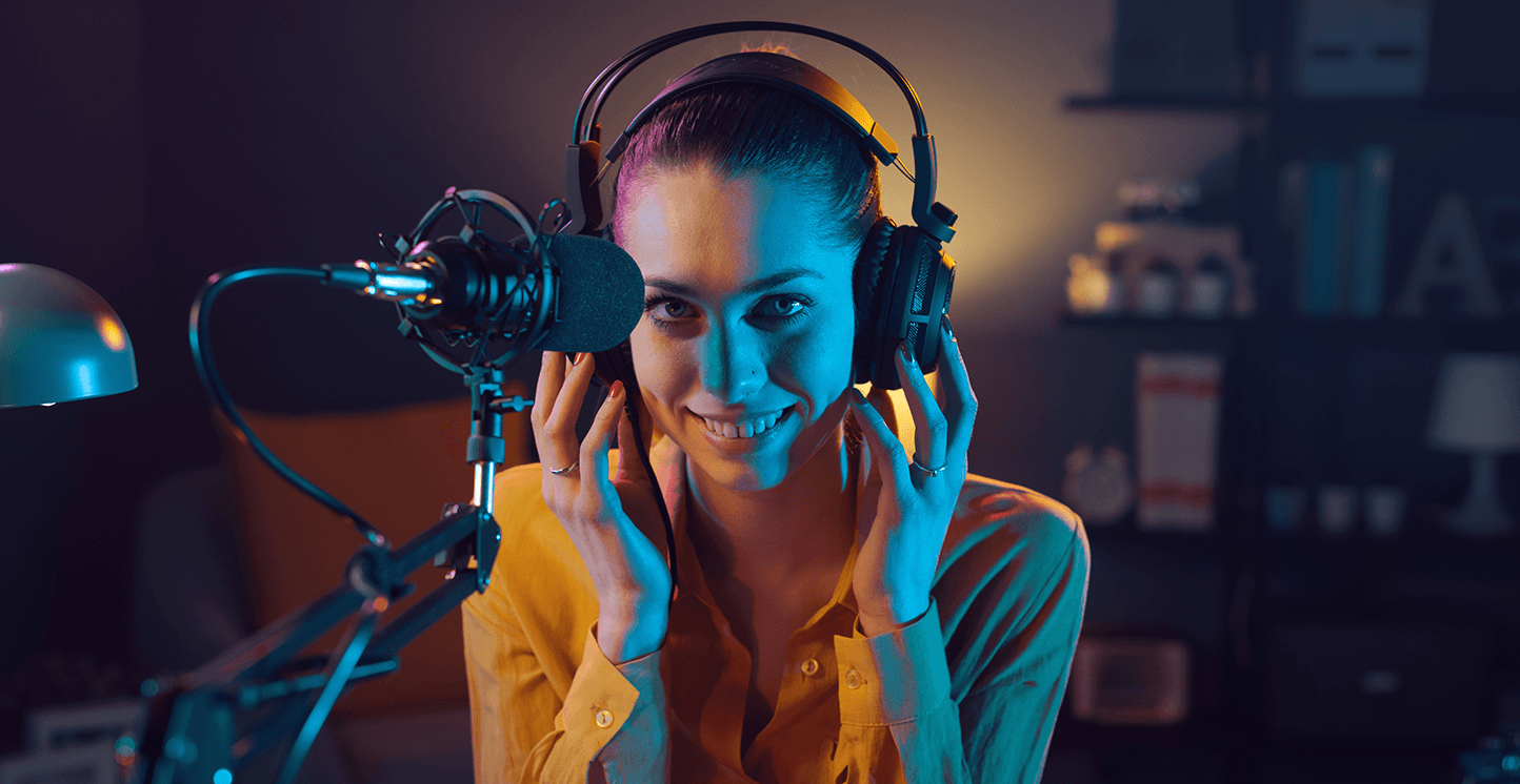 Podcaster listening on headphones